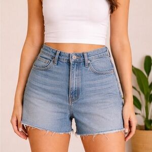 Vintage Levi’s 501 Distressed High-Rise Raw Hem Denim Shorts - Light Blue